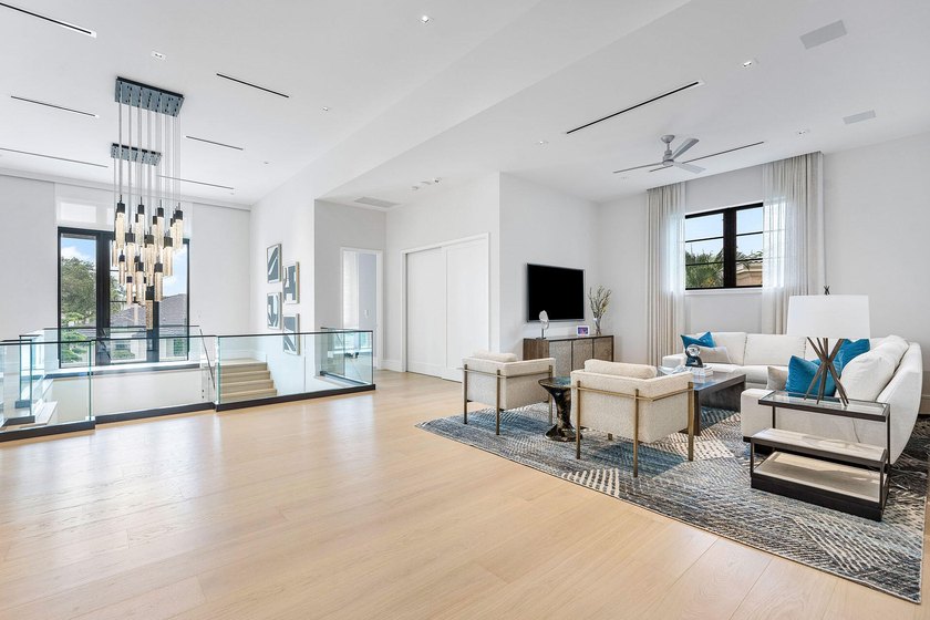 Located in the prestigious Royal Palm Yacht &amp; Country Club, this - photo 49