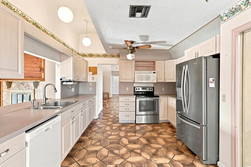 Spacious 4-bedroom, 2-bathroom pool home offering incredible - photo 25