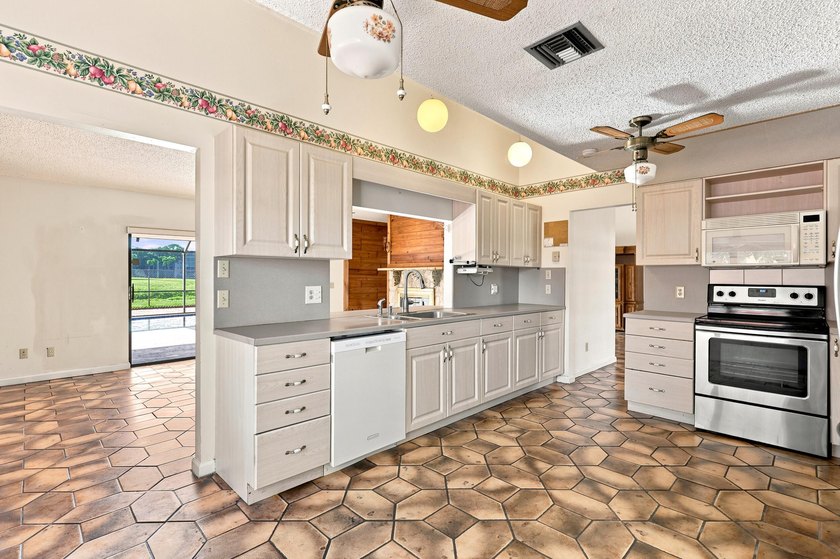 Spacious 4-bedroom, 2-bathroom pool home offering incredible - photo 27