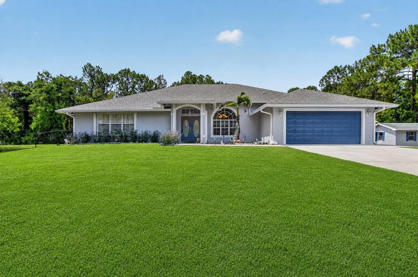 Set on a secluded 2.39-acre corner lot in the heart of - photo 2