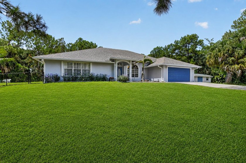 Set on a secluded 2.39-acre corner lot in the heart of - photo 4