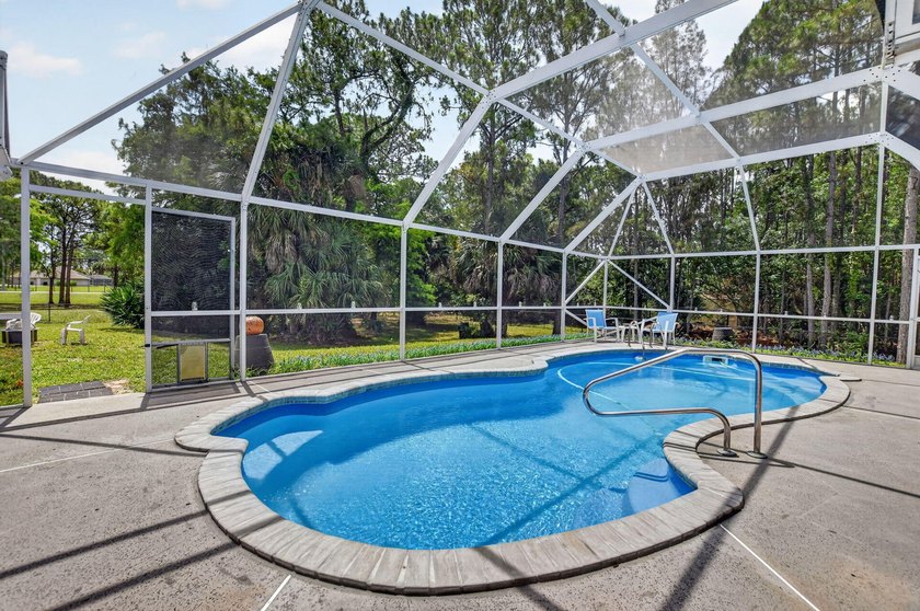 Set on a secluded 2.39-acre corner lot in the heart of - photo 5