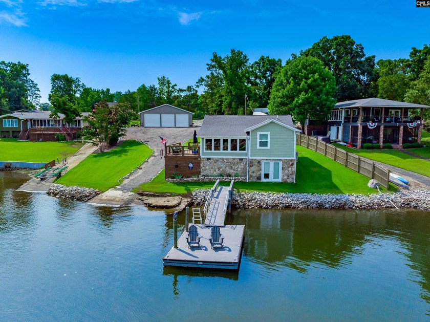 Experience refined waterfront living in this completely - photo 8