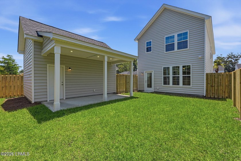 This two-story home includes three bedrooms and two-and-one-half - photo 25
