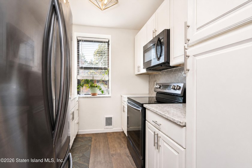 Welcome to 1160 Richmond Road, Unit 2F! Ideally situated on the - photo 17