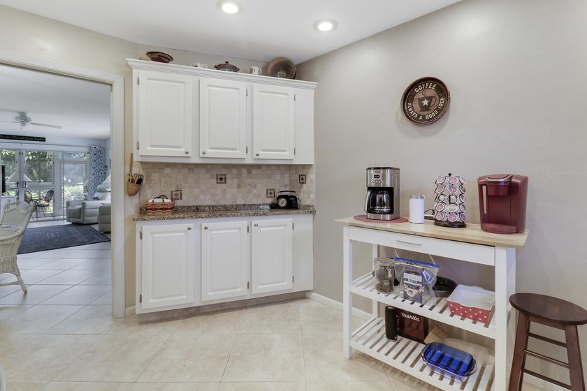 Only available ground-floor end unit in the sought-after - photo 9