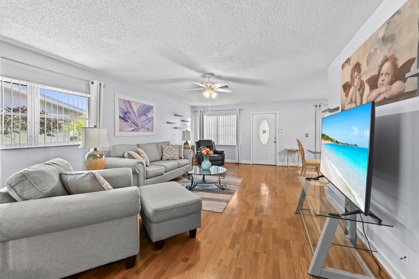 Cypress Lakes is a gated 55+ community featuring a - photo 11