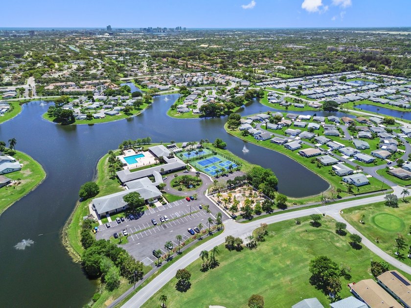Cypress Lakes is a gated 55+ community featuring a - photo 26