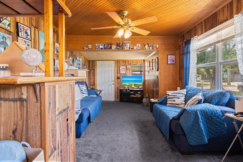 This 3-bedroom, 1-bathroom single-family home provides a - photo 2