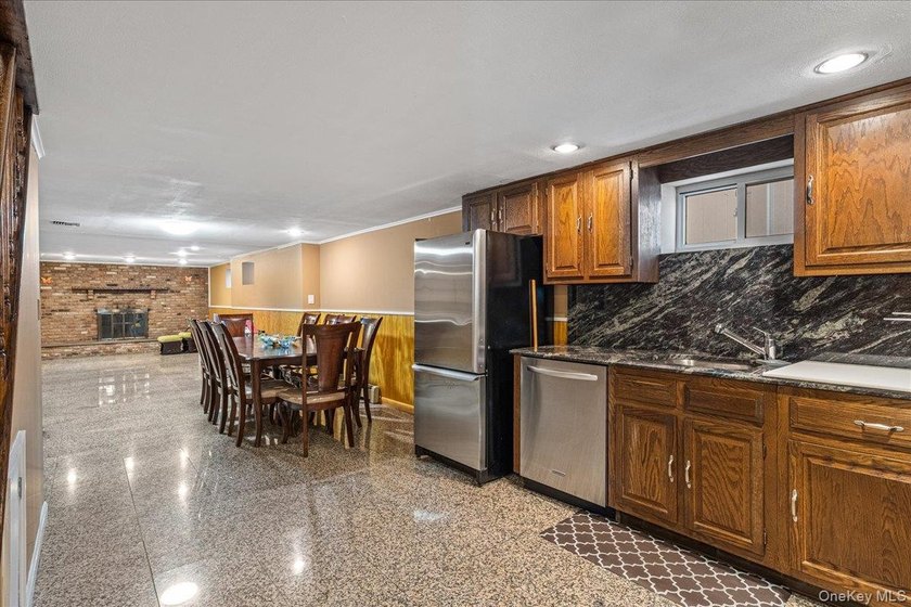 Rarely Available in Coveted Beechhurst! This impeccably - photo 22
