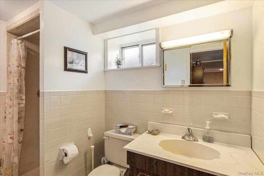 Rarely Available in Coveted Beechhurst! This impeccably - photo 25