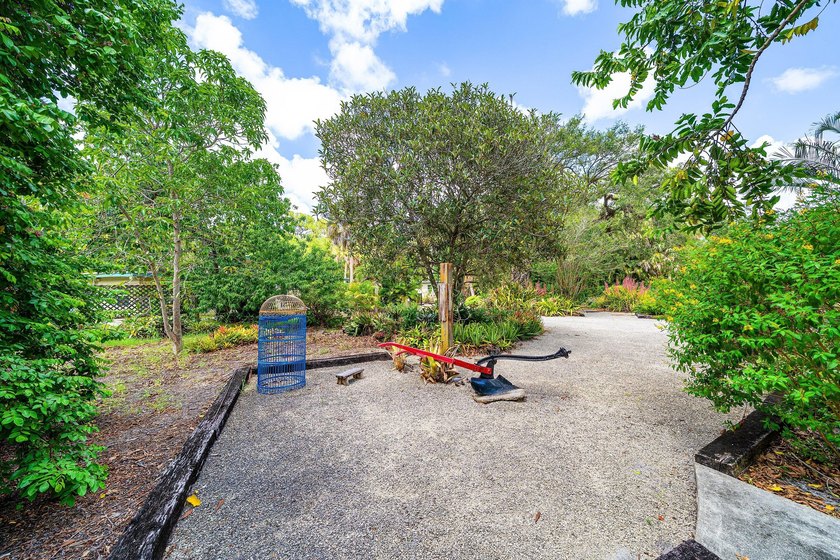Situated on an exceptional &amp; rare oversized lot (3/4+ acre) of - photo 11