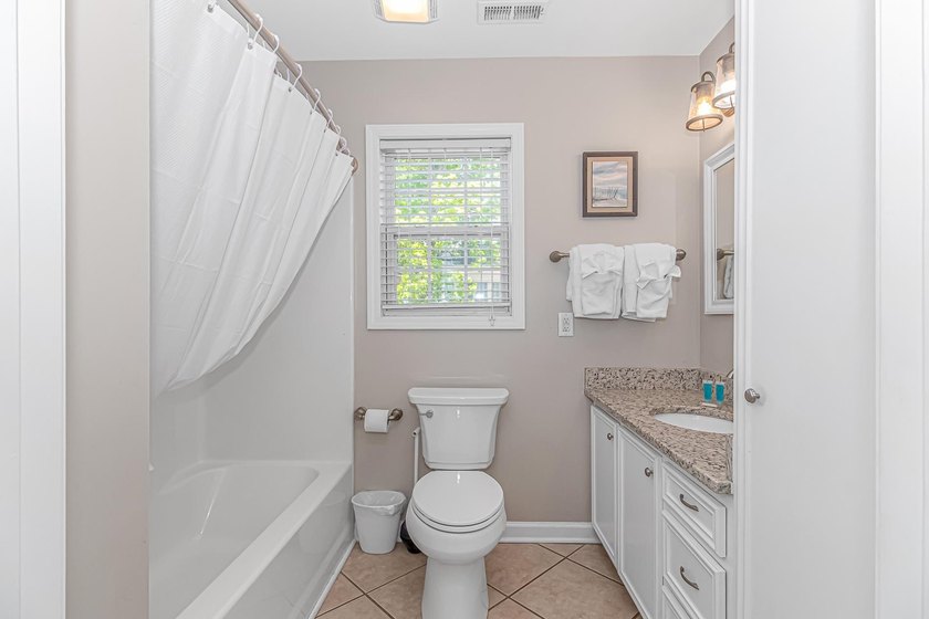 This very open and spacious 4-Bedroom, 3 -Bath raised beach - photo 14