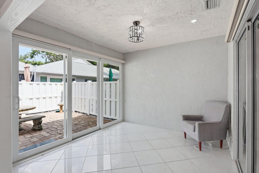 Nice 2/2 Corner Unit Villa w/ a new roof and has a 1 Car garage - photo 17