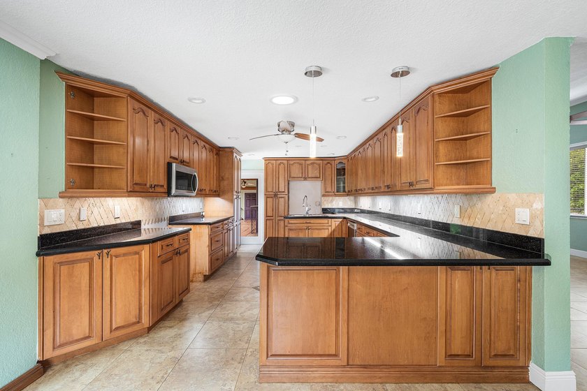 Situated on an exceptional &amp; rare oversized lot (3/4+ acre) of - photo 21