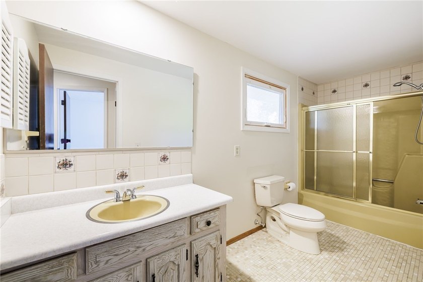 This well-maintained 3-bedroom, 1.5-bath split level home offers - photo 24