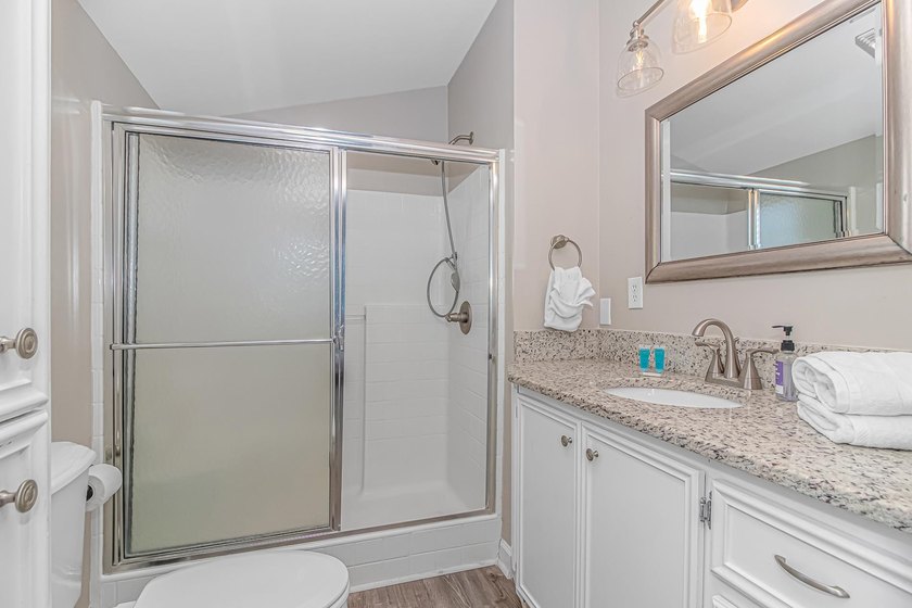 This very open and spacious 4-Bedroom, 3 -Bath raised beach - photo 24