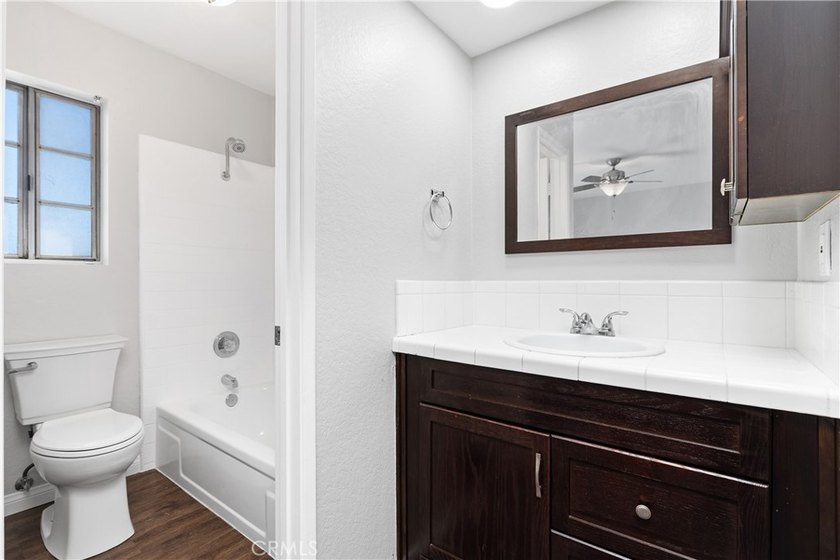 This two-story, townhouse-style condominium offers two primary - photo 23