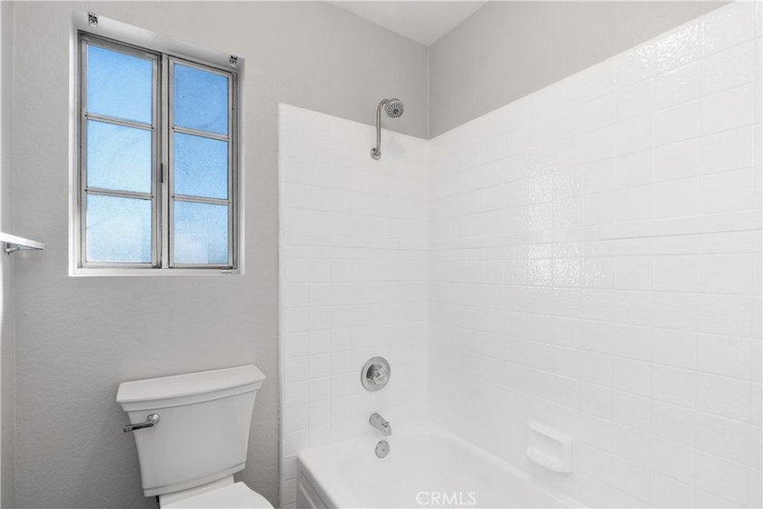 This two-story, townhouse-style condominium offers two primary - photo 24