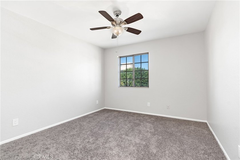 This two-story, townhouse-style condominium offers two primary - photo 27
