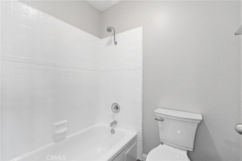 This two-story, townhouse-style condominium offers two primary - photo 31