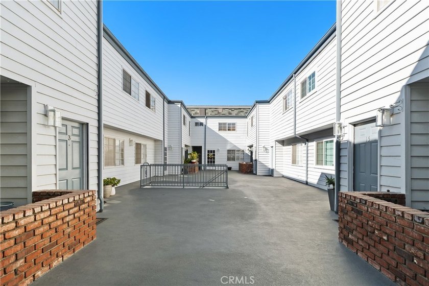 This two-story, townhouse-style condominium offers two primary - photo 32