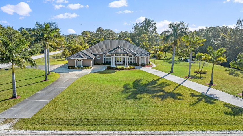 Nestled on 2.5 private acres, this beautifully updated estate - photo 2