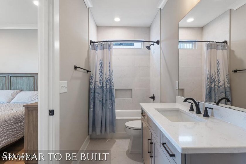 Experience coastal luxury from one of Ocean Isle Beach's most - photo 27