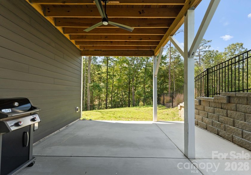 Quietly tucked along the wooded shoreline of Lake Wylie, this - photo 42