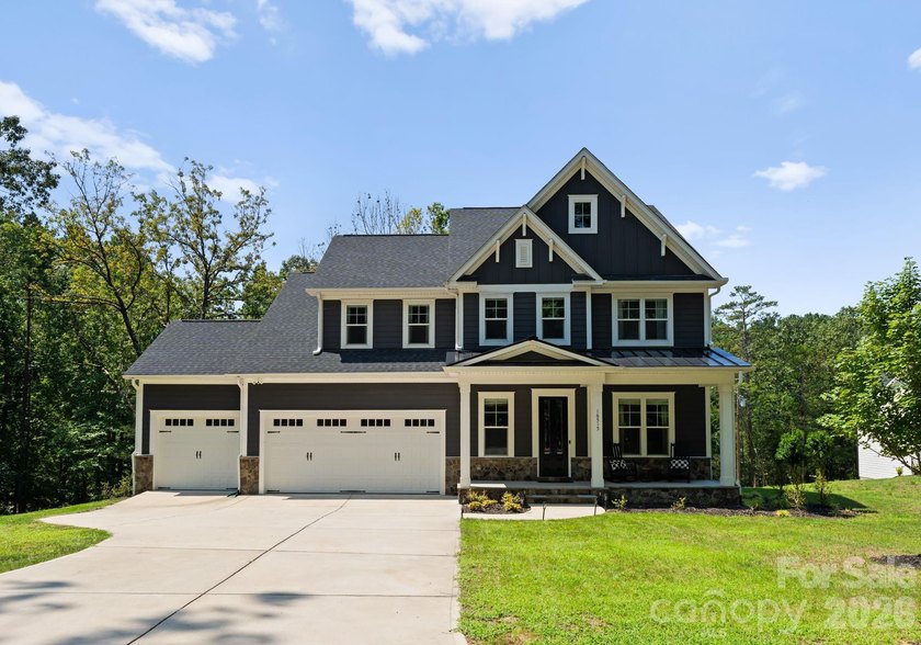 Quietly tucked along the wooded shoreline of Lake Wylie, this - photo 48