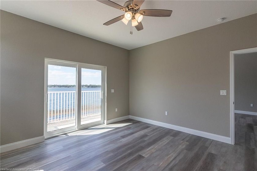 Waterfront townhome development with 3 completed units and over - photo 12