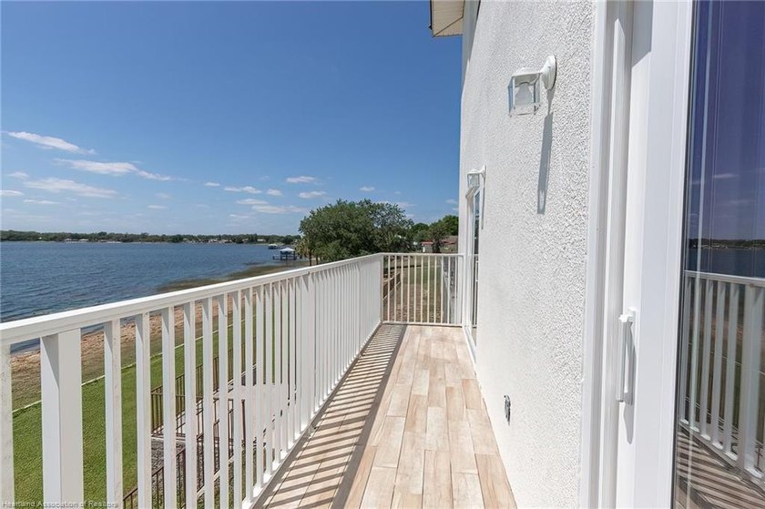 Waterfront townhome development with 3 completed units and over - photo 16