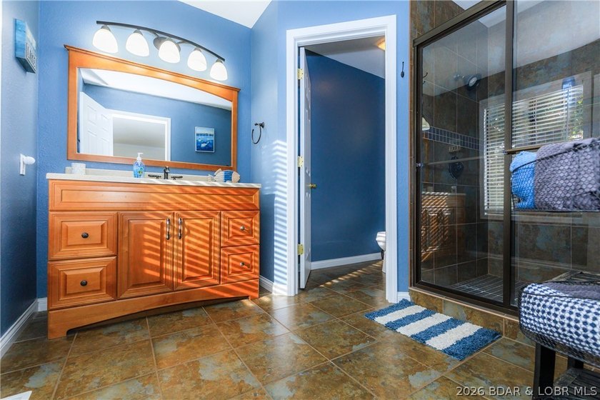 This stunningly remodeled lakefront home in Camdenton, Missouri - photo 14