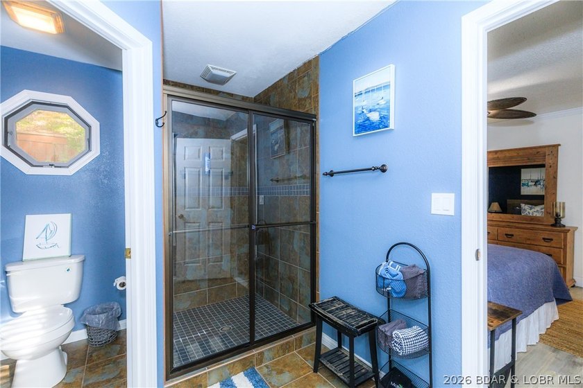 This stunningly remodeled lakefront home in Camdenton, Missouri - photo 15