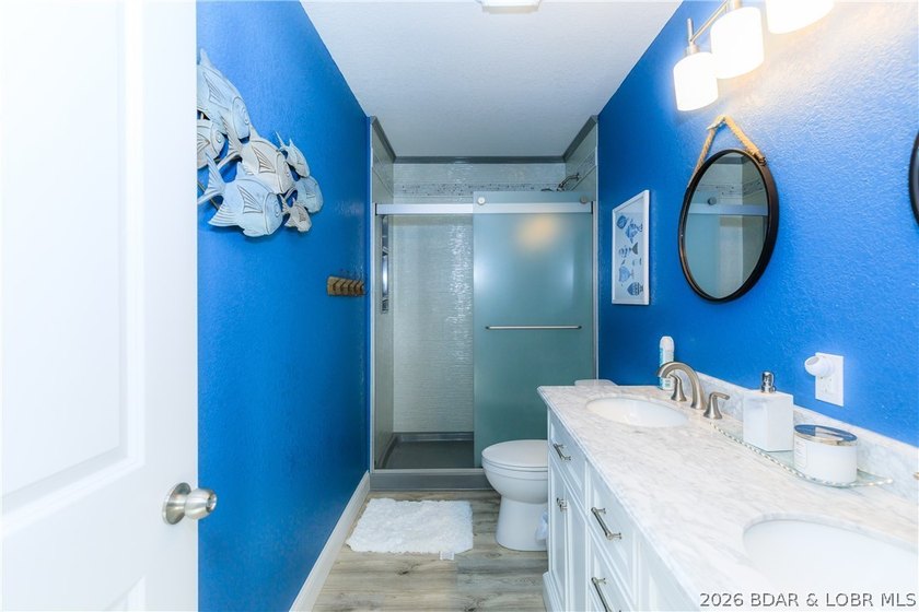 This stunningly remodeled lakefront home in Camdenton, Missouri - photo 17