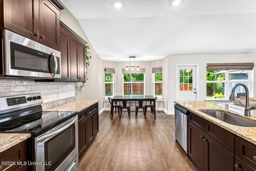 Welcome home to Emerald Lake Estates! This beautiful 4-bedroom - photo 17
