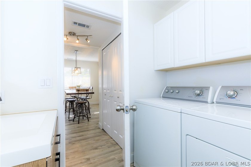 This stunningly remodeled lakefront home in Camdenton, Missouri - photo 27