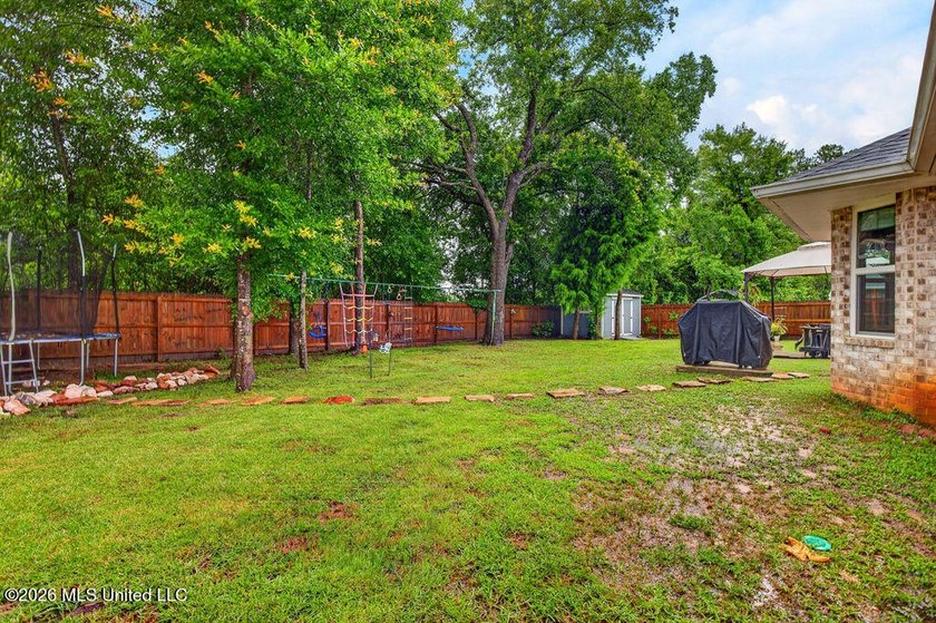 Welcome home to Emerald Lake Estates! This beautiful 4-bedroom - photo 34