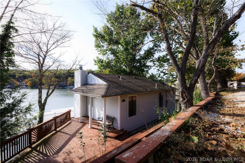 This stunningly remodeled lakefront home in Camdenton, Missouri - photo 36