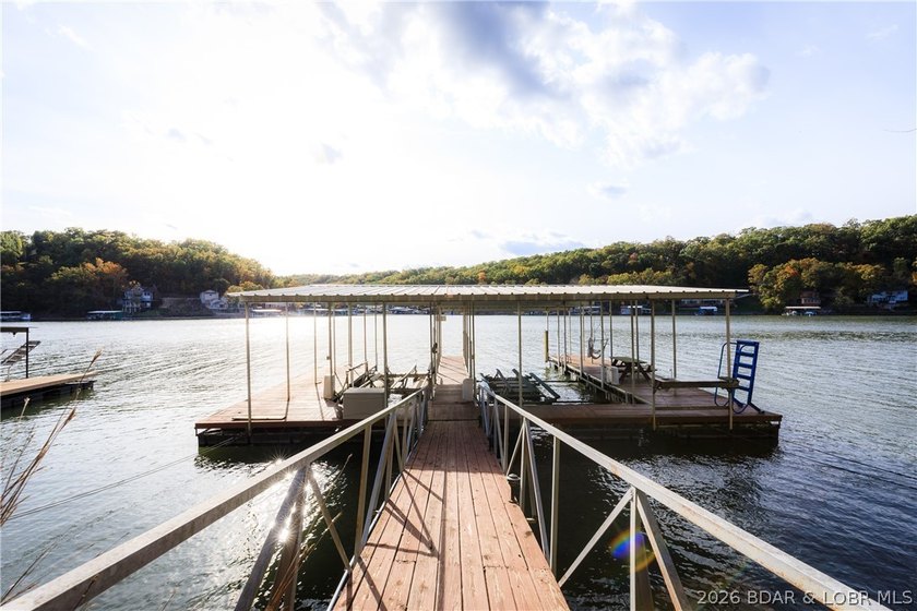 This stunningly remodeled lakefront home in Camdenton, Missouri - photo 37
