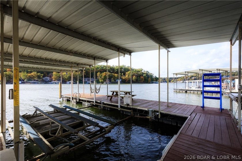 This stunningly remodeled lakefront home in Camdenton, Missouri - photo 38