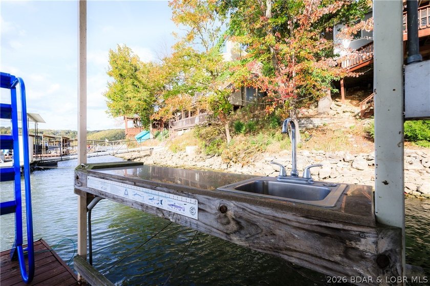 This stunningly remodeled lakefront home in Camdenton, Missouri - photo 40