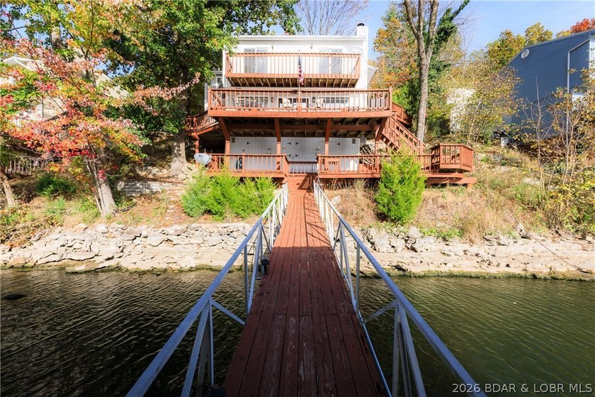 This stunningly remodeled lakefront home in Camdenton, Missouri - photo 41