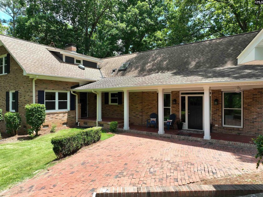 Tucked away on 3.84 sprawling acres with its own private - photo 2