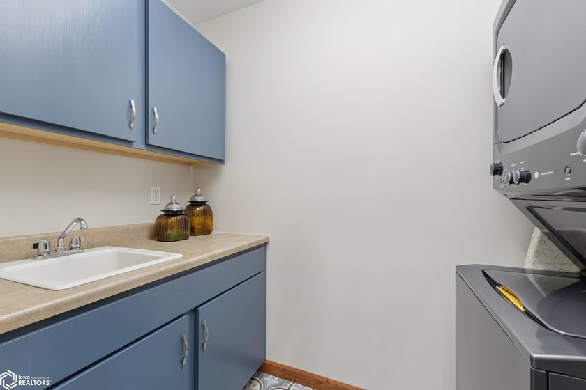 Welcome home to this beautifully updated 3-bedroom, 3-bath twin - photo 9