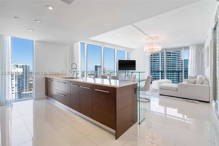 Experience luxury living at Icon Brickell Tower I. This bright - photo 4