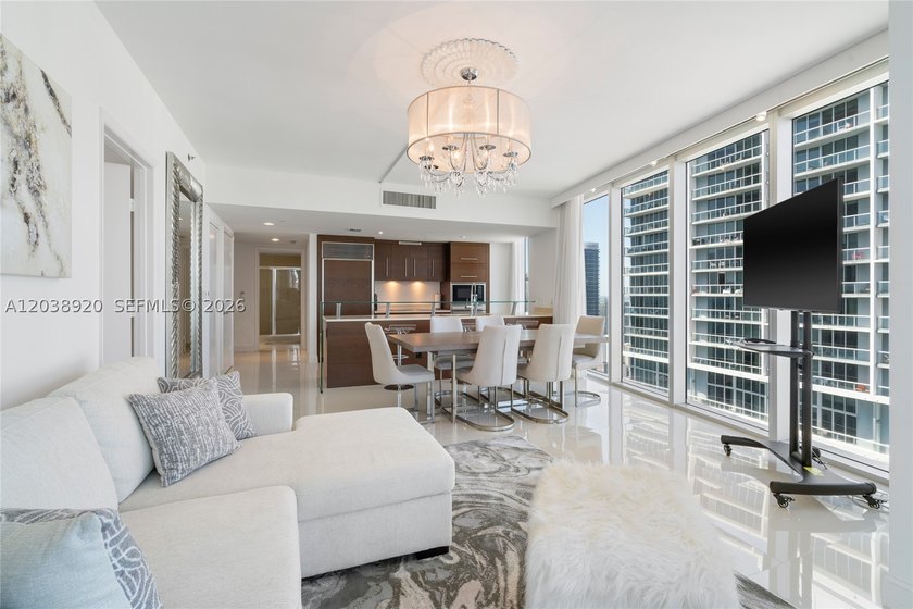Experience luxury living at Icon Brickell Tower I. This bright - photo 7