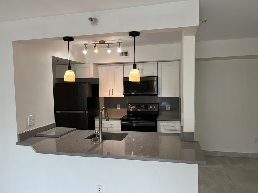 Exceptional opportunity to purchase a 2 bedroom 1 bath condo in - photo 3