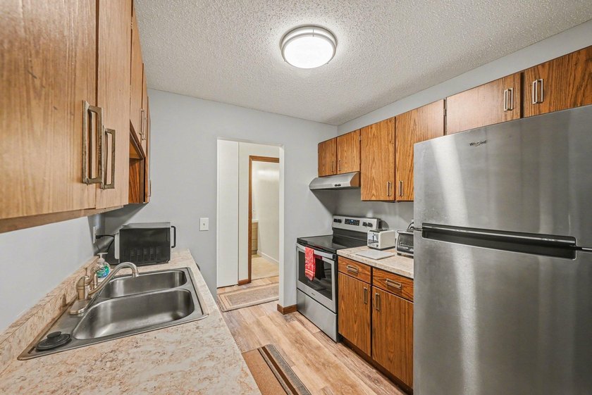 Experience maintenance-free lake living at its finest in this - photo 15