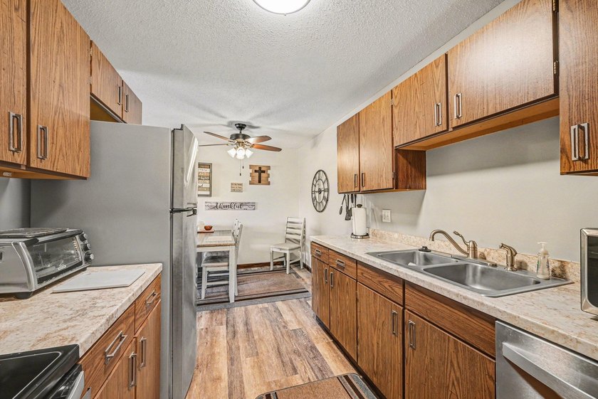 Experience maintenance-free lake living at its finest in this - photo 16